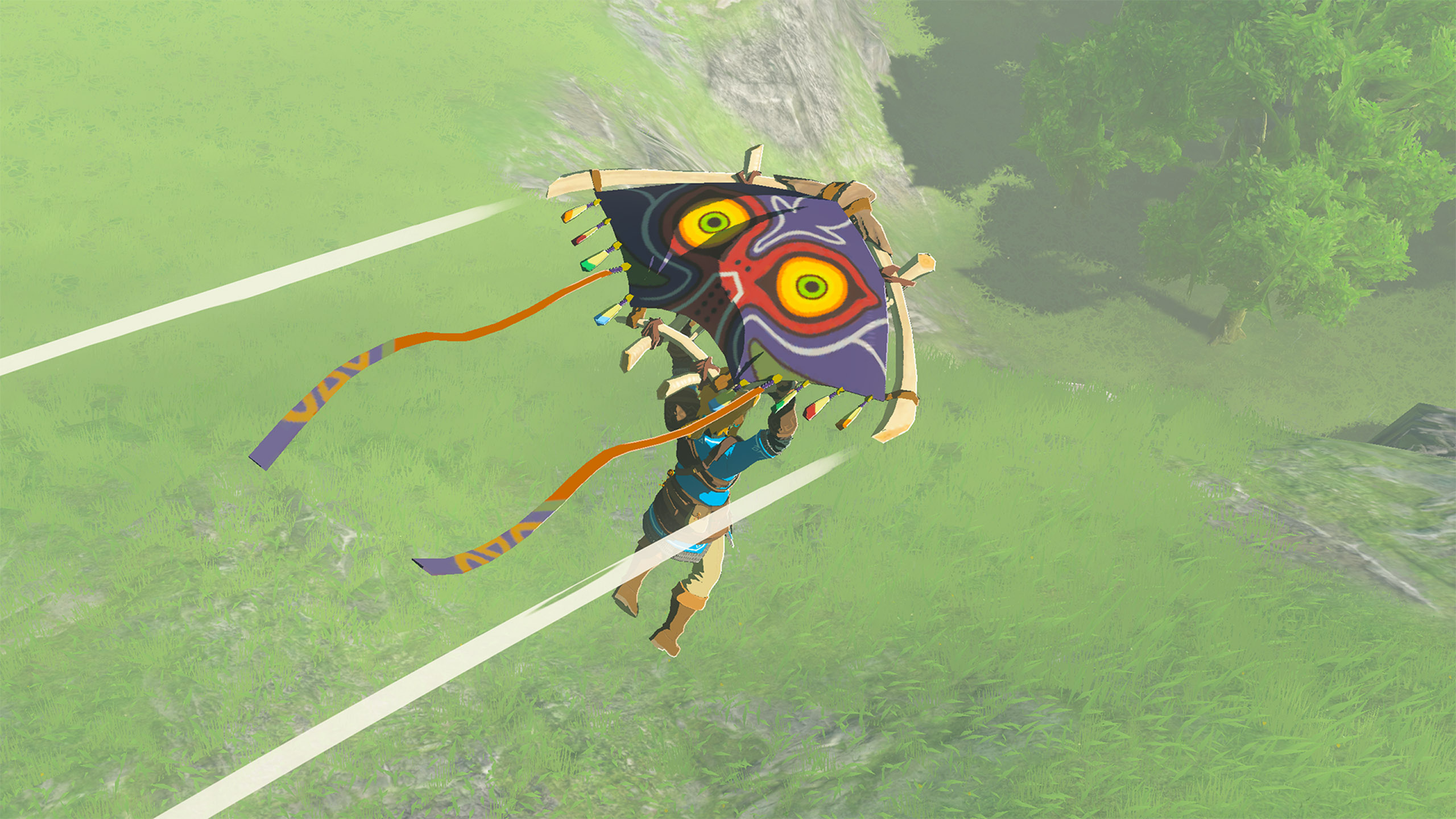 Link and his paraglider are seen from above, revealing the stretched cloth is painted purple with two large yellow eyes (in the style of Majora's Mask).