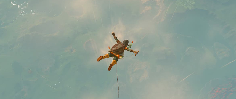Seen from above, Link falls through the Hyrule sky, arms and legs outstretched.