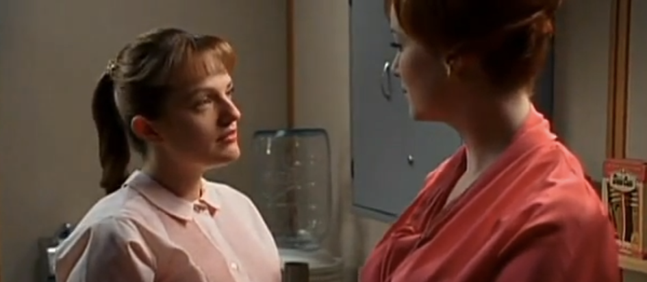 A screenshot from Mad Men where Joan is trying to help Peggy but it's mostly coming off as mean and Peggy's not having it