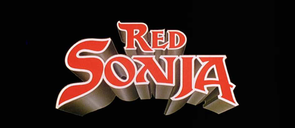 A screenshot from the trailer for Red Sonja with the title of the movie in bold red serif letters with a depth perspective effect