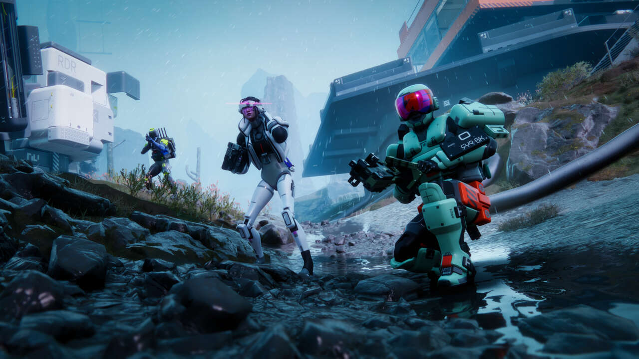 Three futuristic, armored characters, "shells" within the Marathon's universe, navigate a rugged, wet, and rocky outdoor environment with some industrial structures in the background.