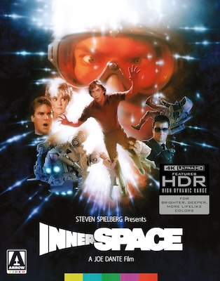 The cover art for Innerspace with Martin Short surrounded by all th eother actors and lots of crazy lights