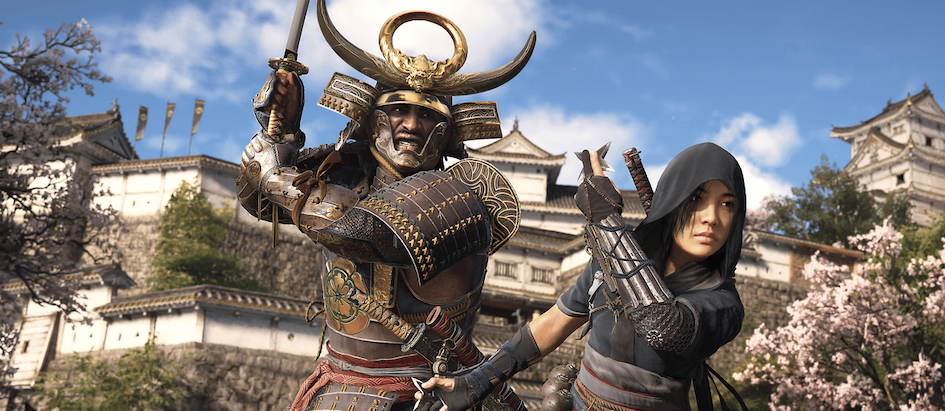 A promo image for Assassin's Creed: Shadows with the ninja and the samurai standing next to each other in front of a Japanese castle sword and shuriken drawn