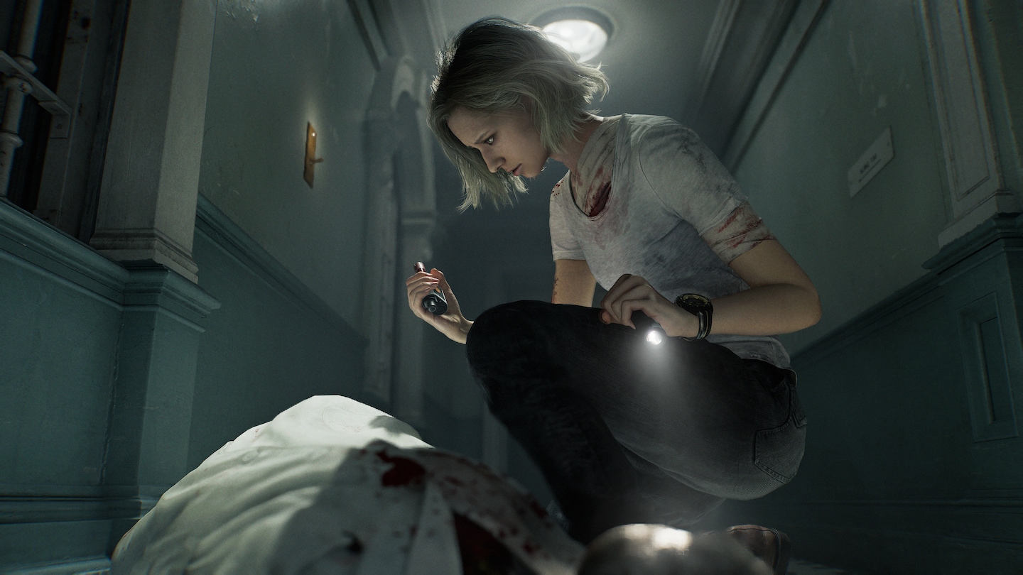 Grace Ashcroft kneels over what looks like a bloodied body in this screenshot from Resident Evil Requiem.